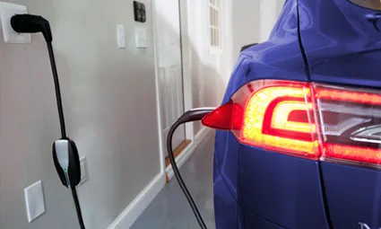 Electric car charging in garage